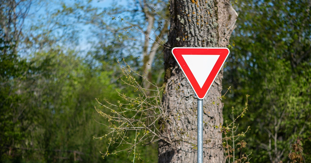 Meaning of yield sign for road safety in driving